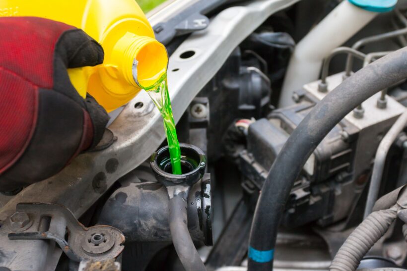 checking cars coolant, oil and other fluids
